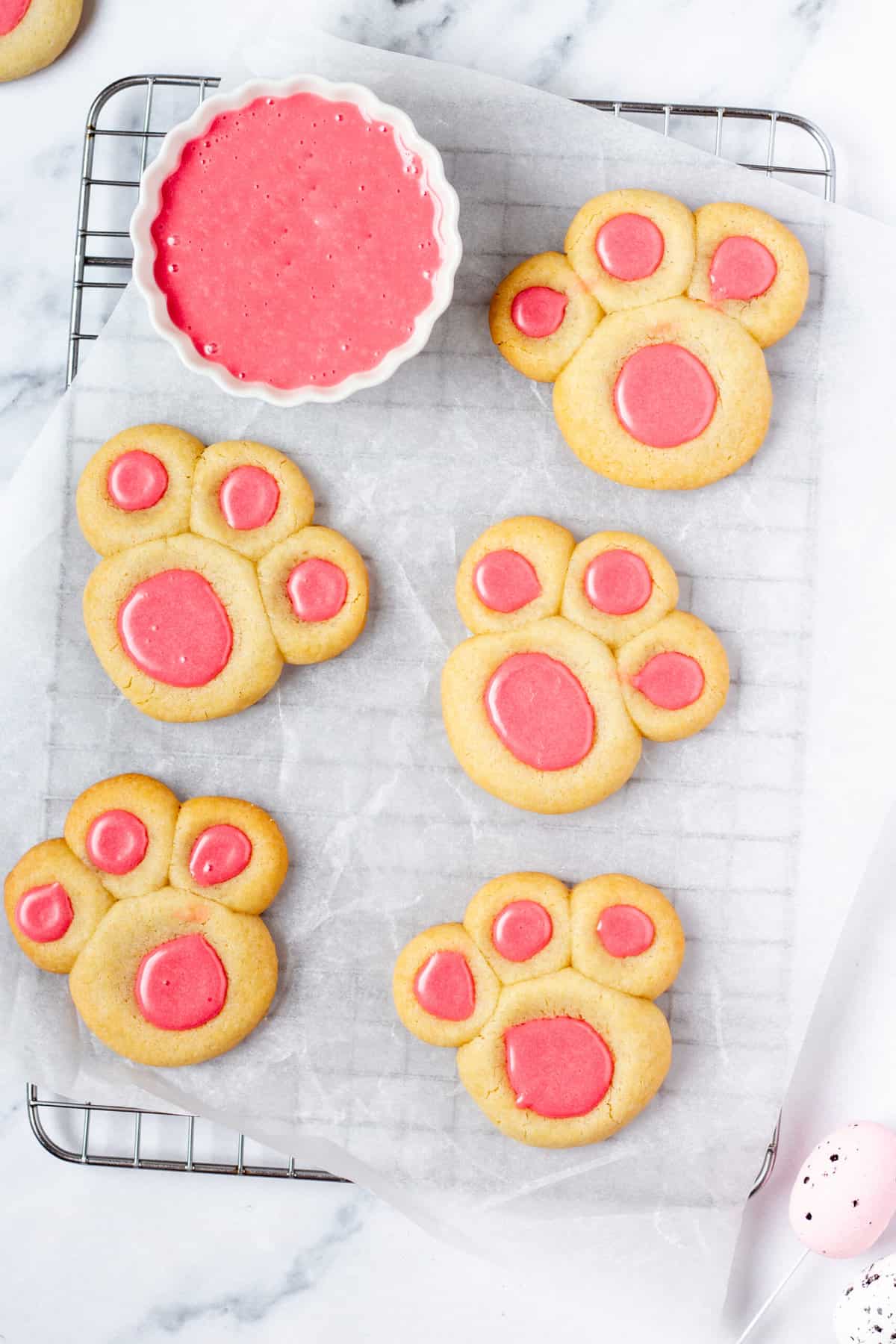 bunny paw cookies on a cooling rack