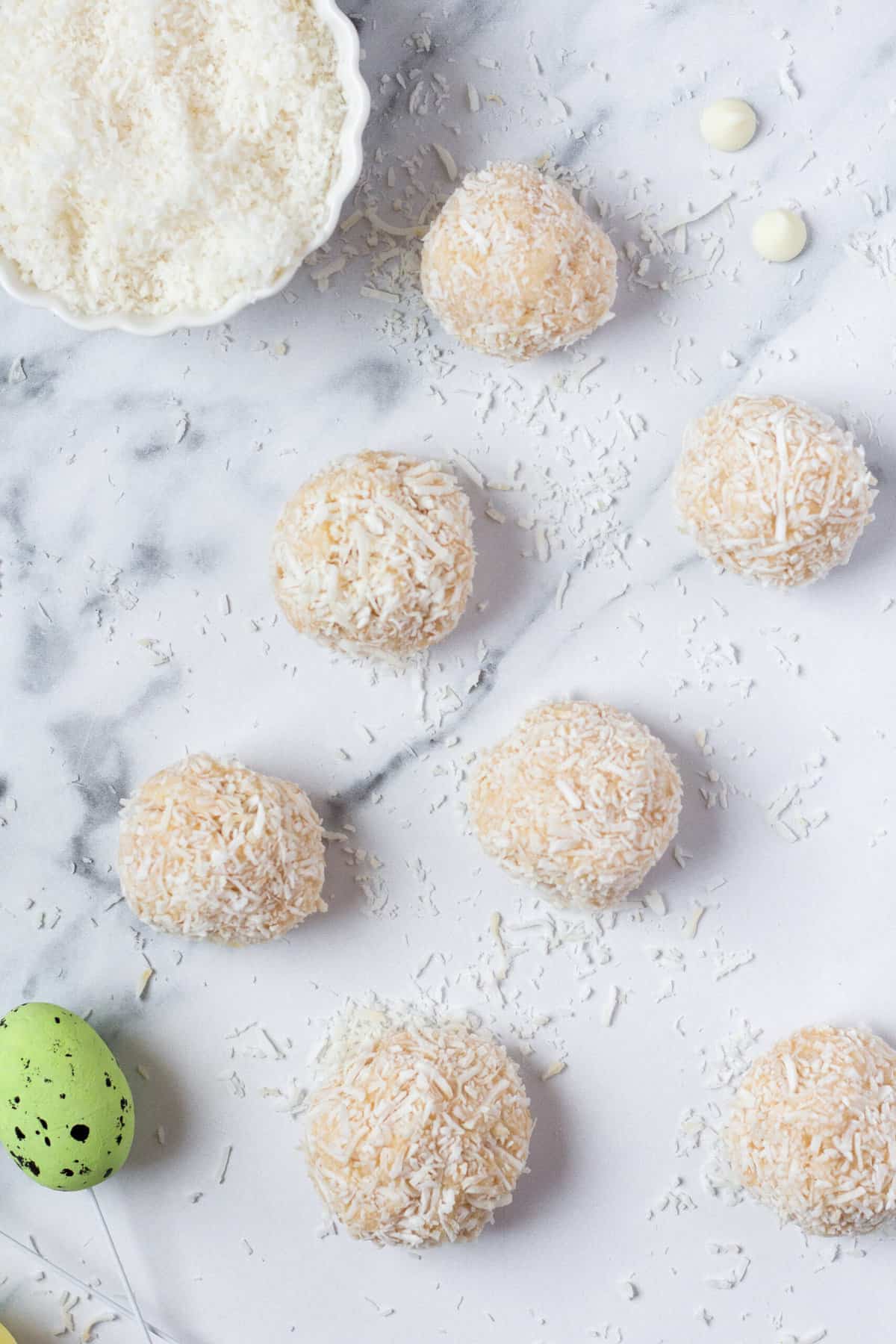 no bake Easter cheesecake bunny tails on parchment paper