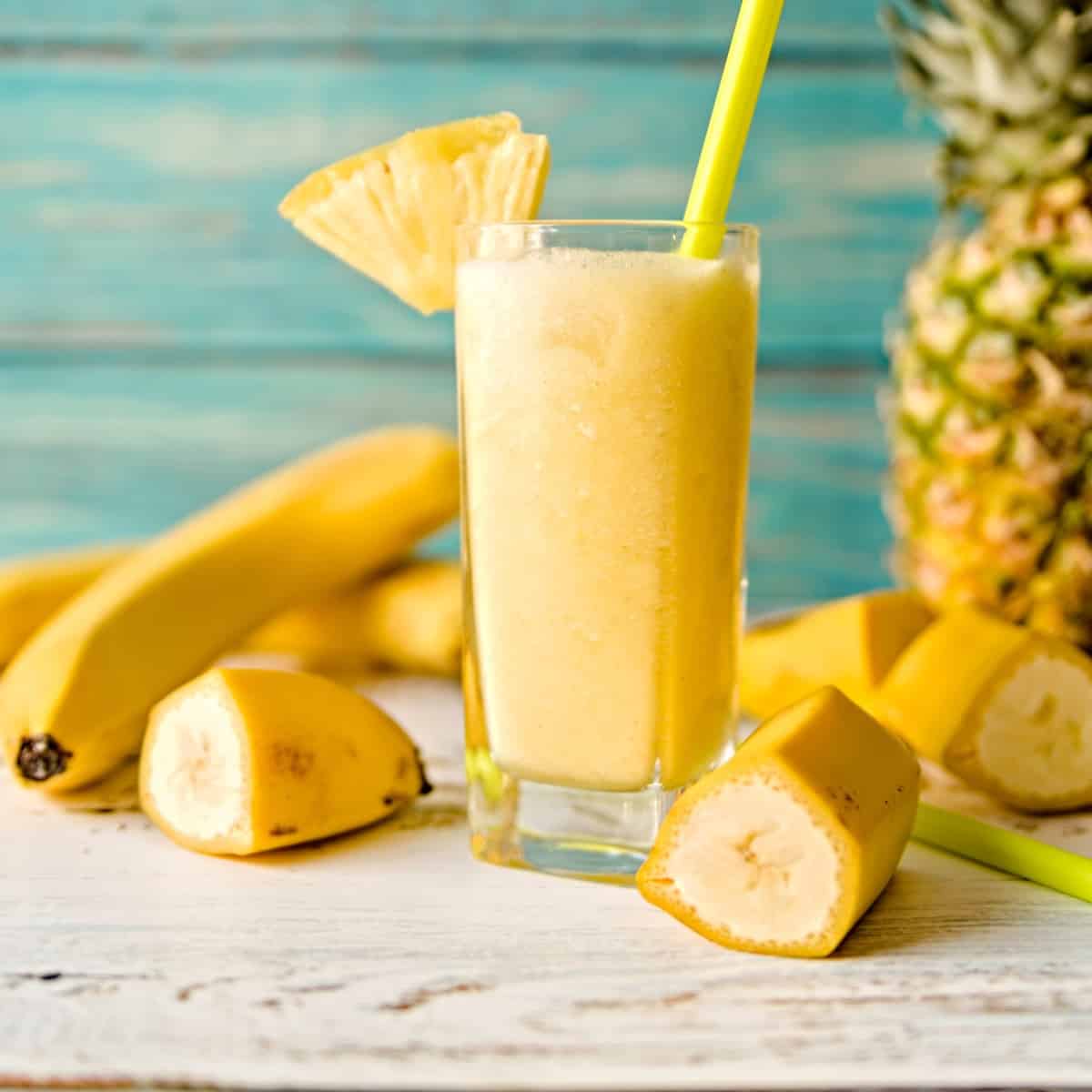 banana pineapple smoothie in a glass