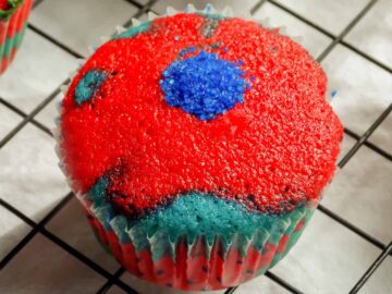 sprinkled filled into a hole in a cupcake