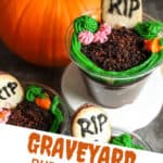 three chocolate graveyard pudding cups decorated with a Milano cookie headstone and pumpkin and flowers