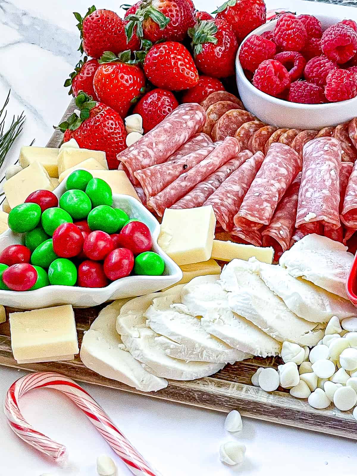 red, green and white charcuterie board for christmas