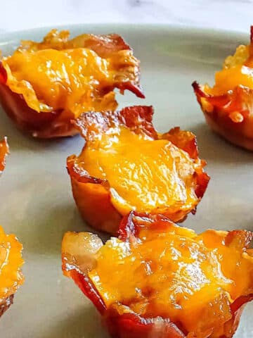 bacon tater tot cups on a gray plate