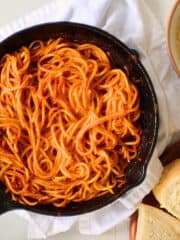 fried spaghetti in a cast iron skillet