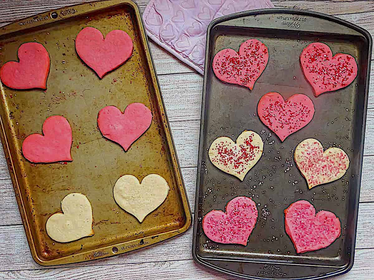 heart shaped cookies on baking sheets after baking