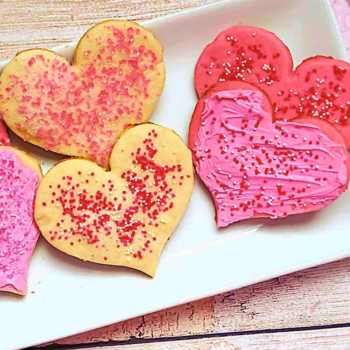 valentines' day butter cookies on a white plate