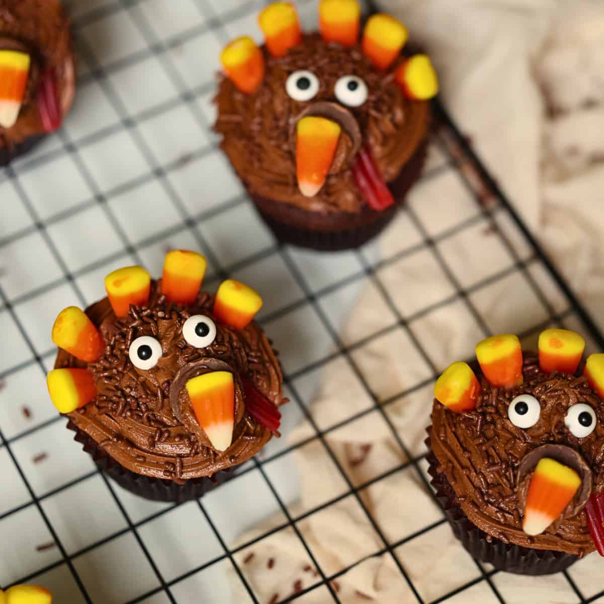 turkey cupcakes on a baking rack