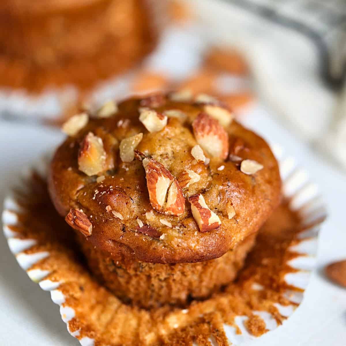 almond butter banana muffin on a serving board