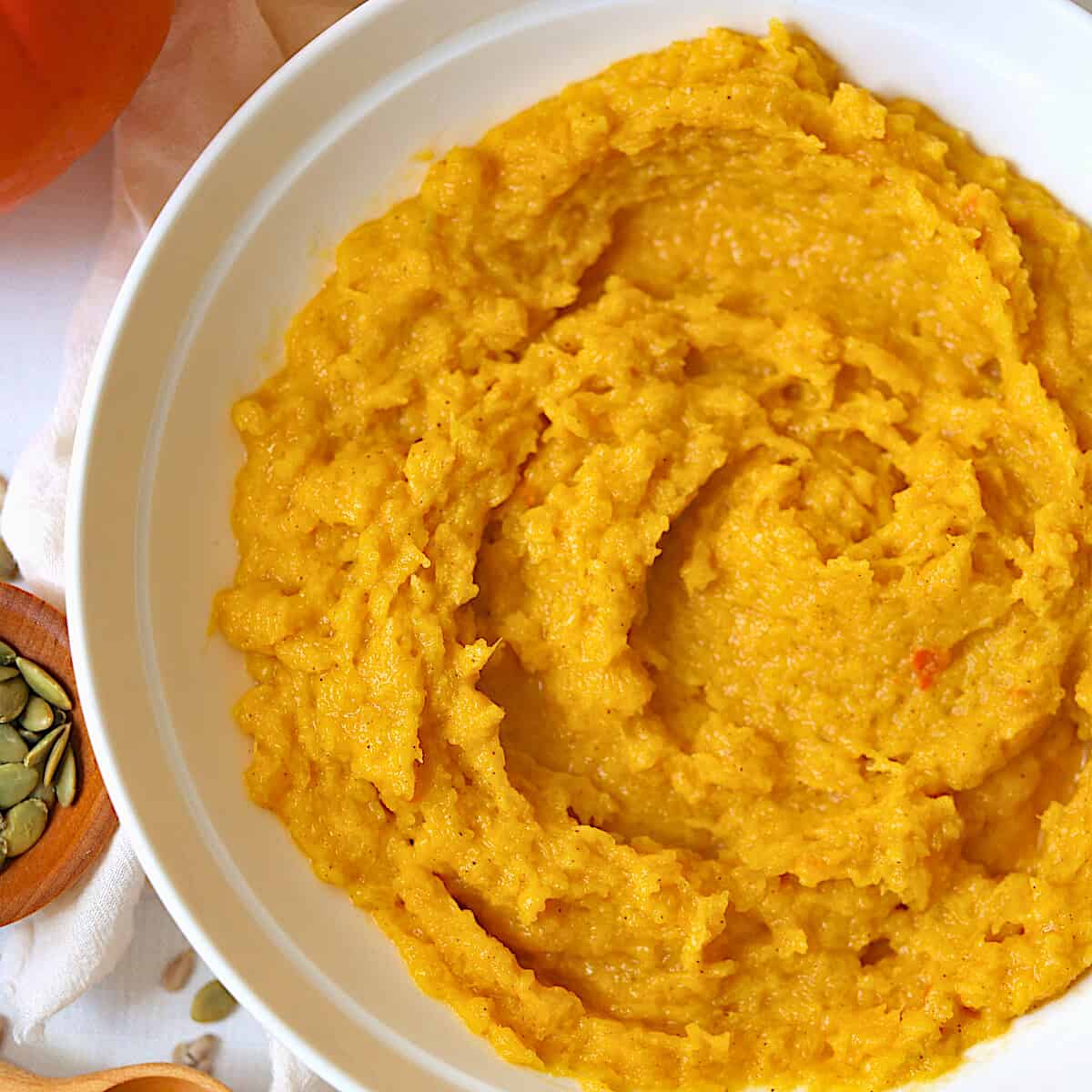 creamy mashed pumpkin on a white plate