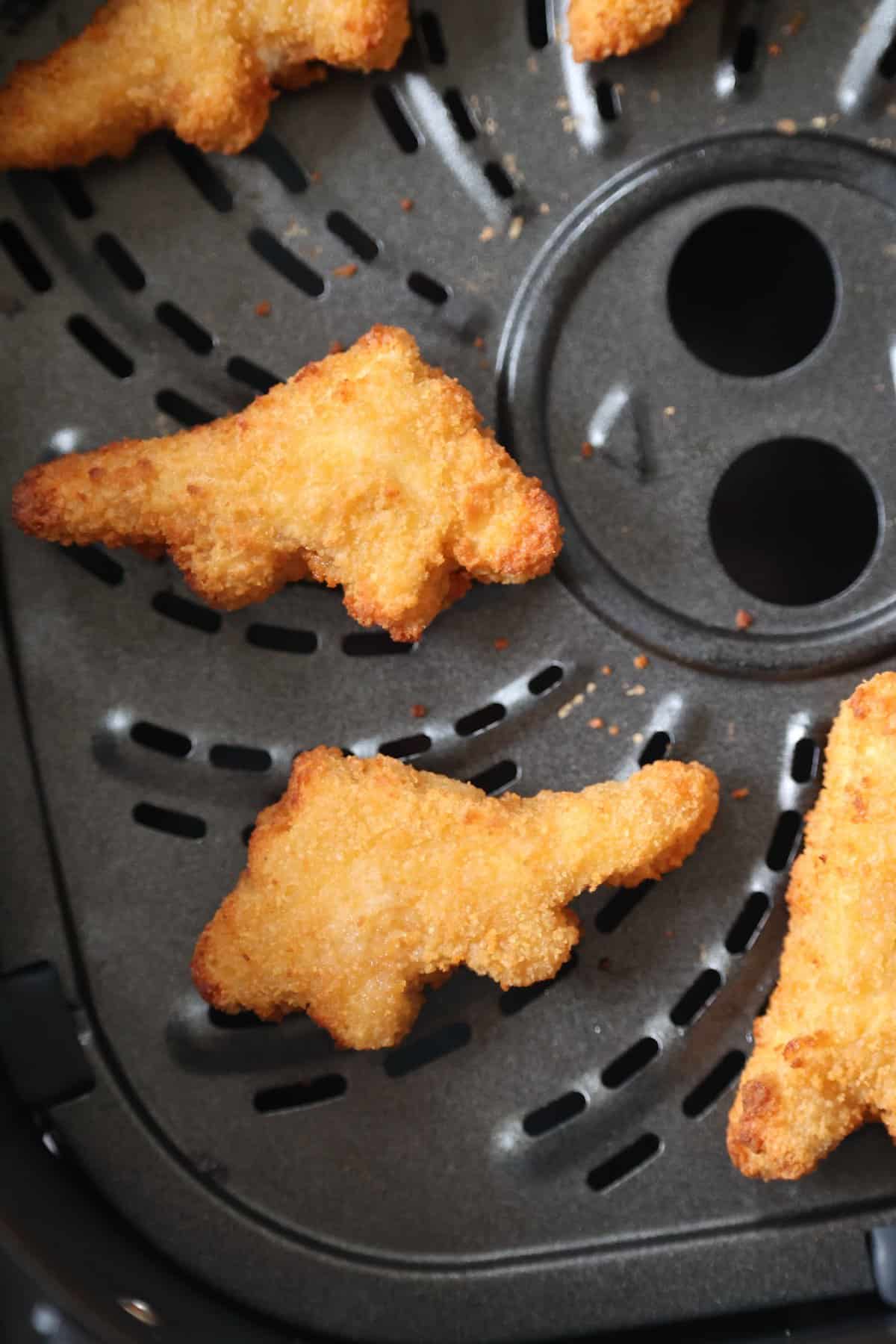 air fried chicken nuggets in the air fryer basket