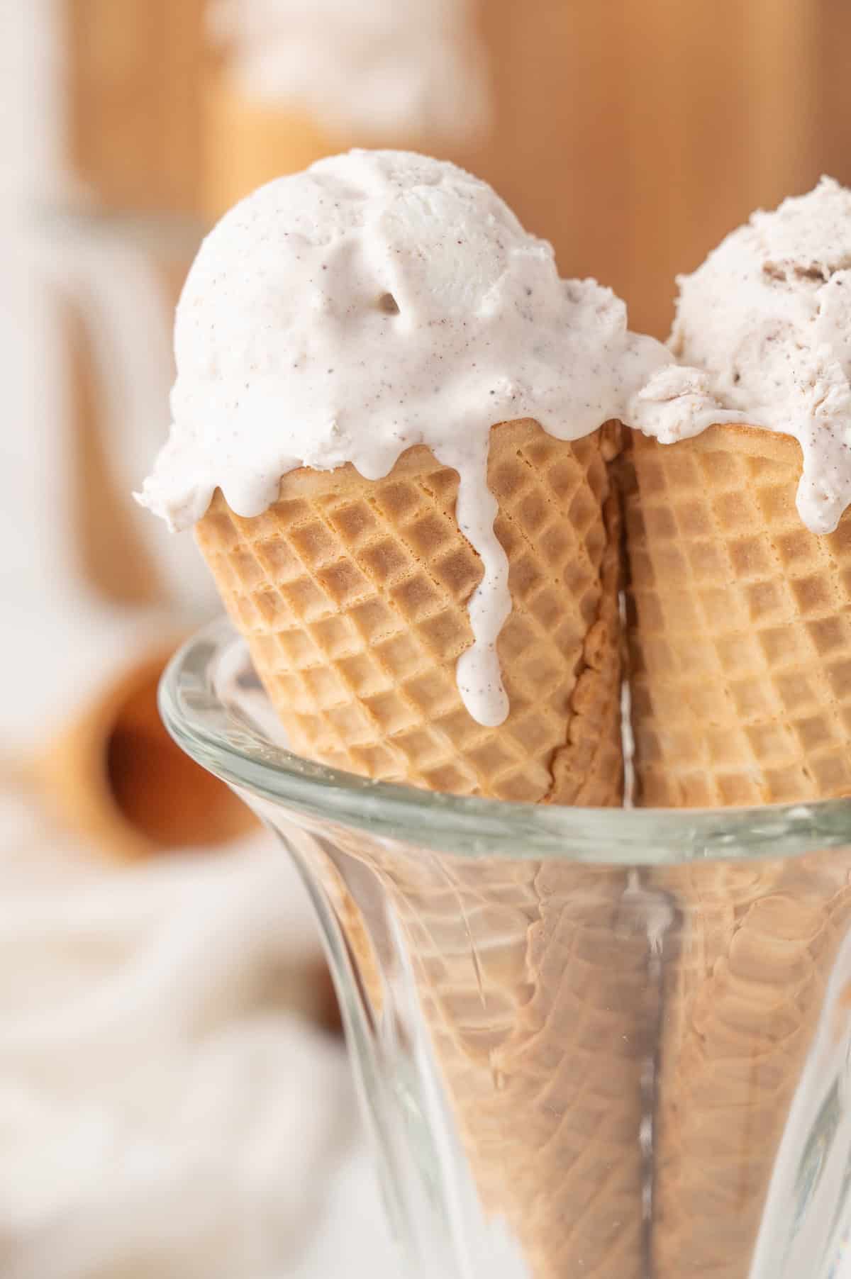 cinnamon roll ice cream in 2 cones