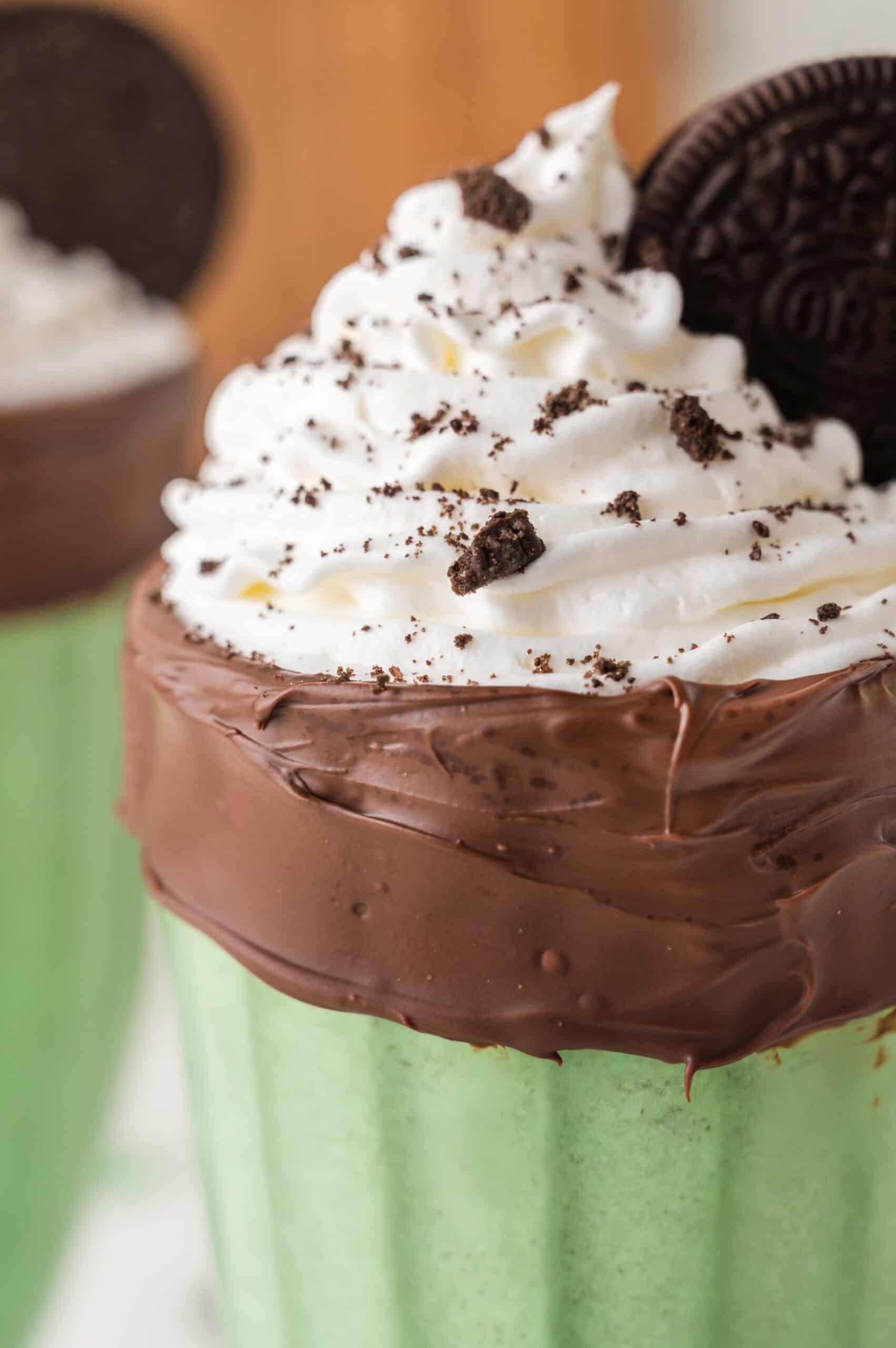 close up of the rim of an Oreo mint milkshake