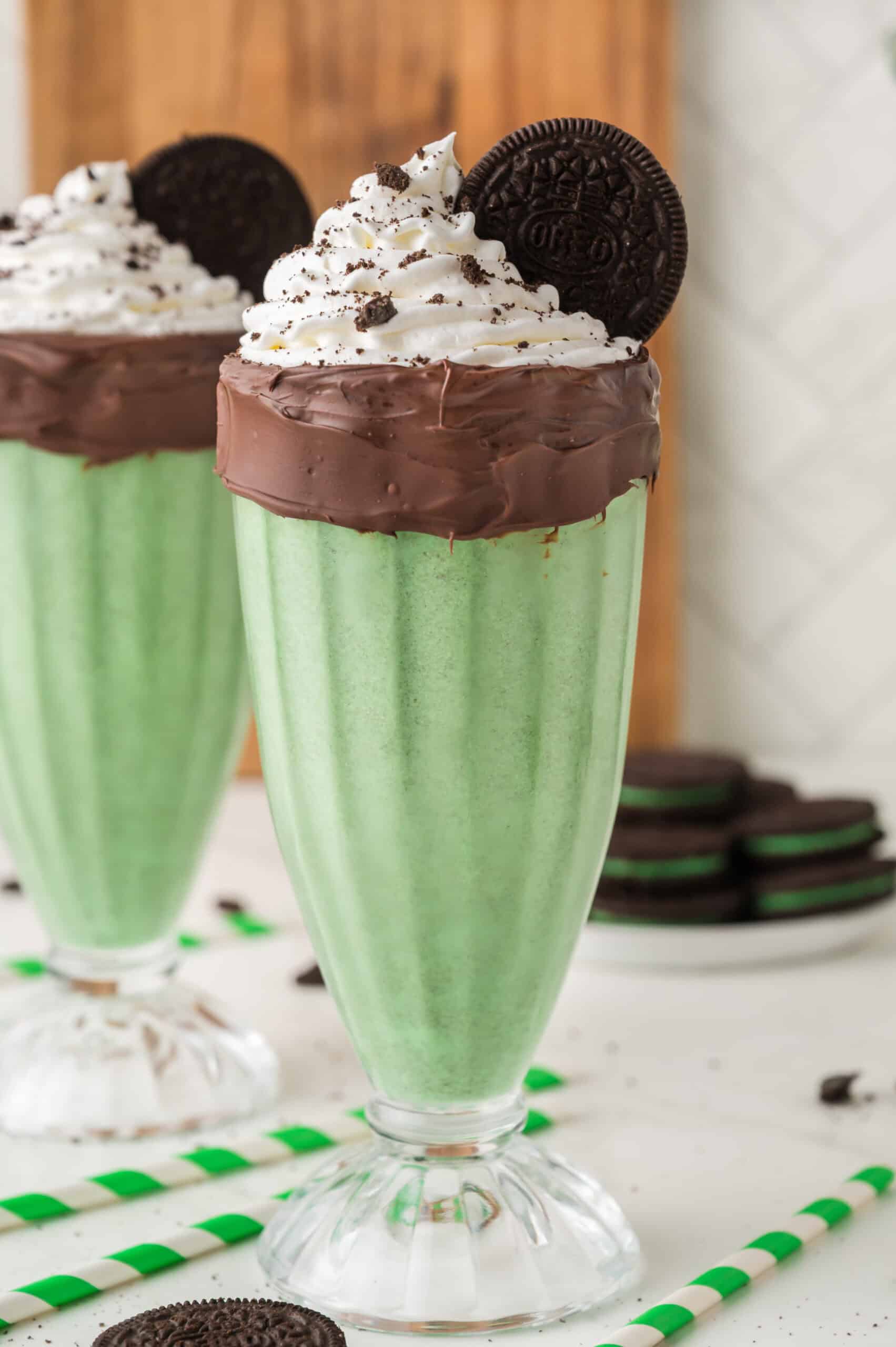 Oreo mint milkshake in a milkshake glass