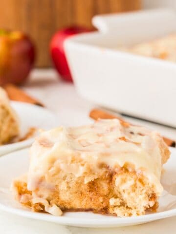 apple cinnamon roll on a white plate
