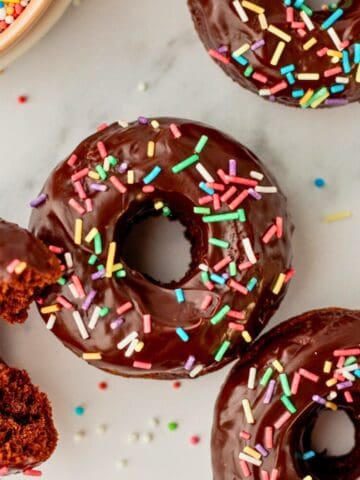 baked chocolate donuts on a white background