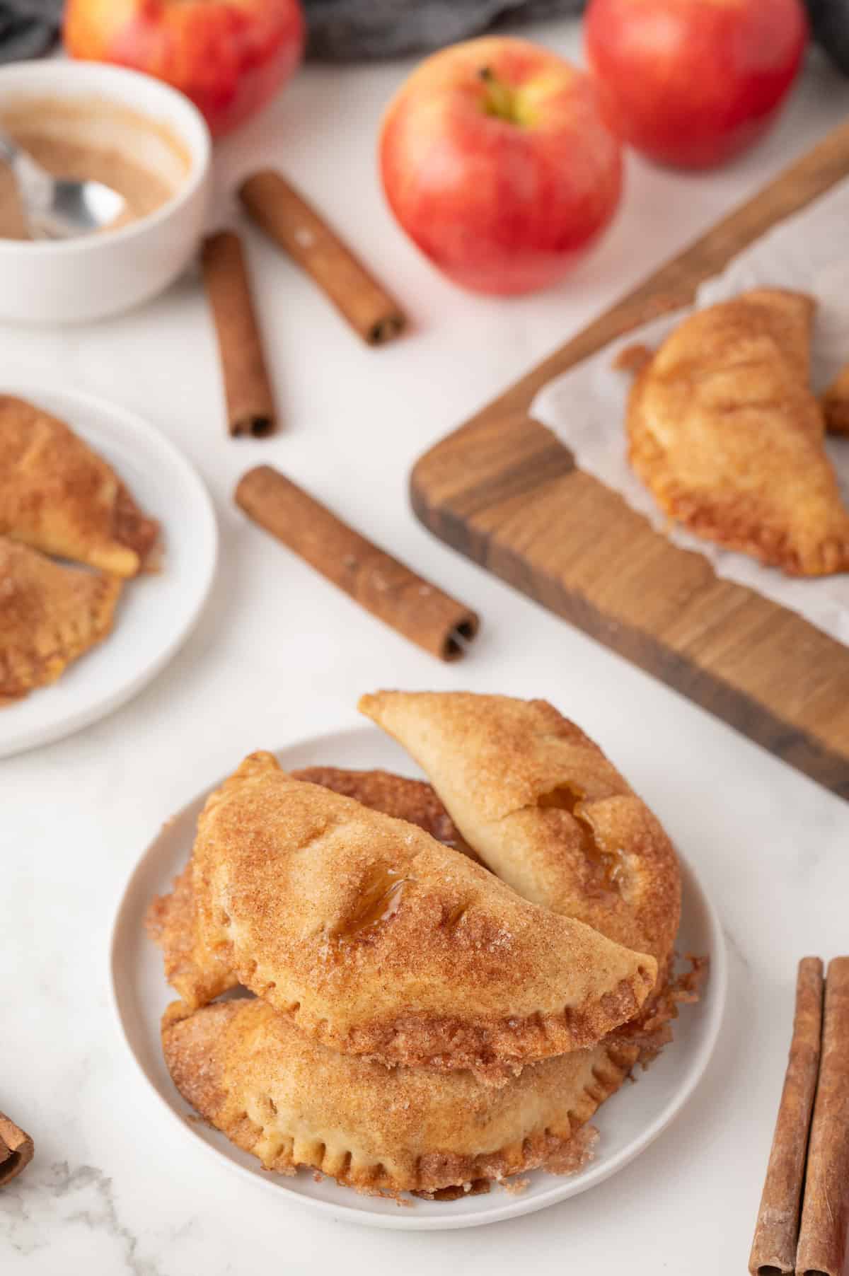 apple pie hand pies on a white plate