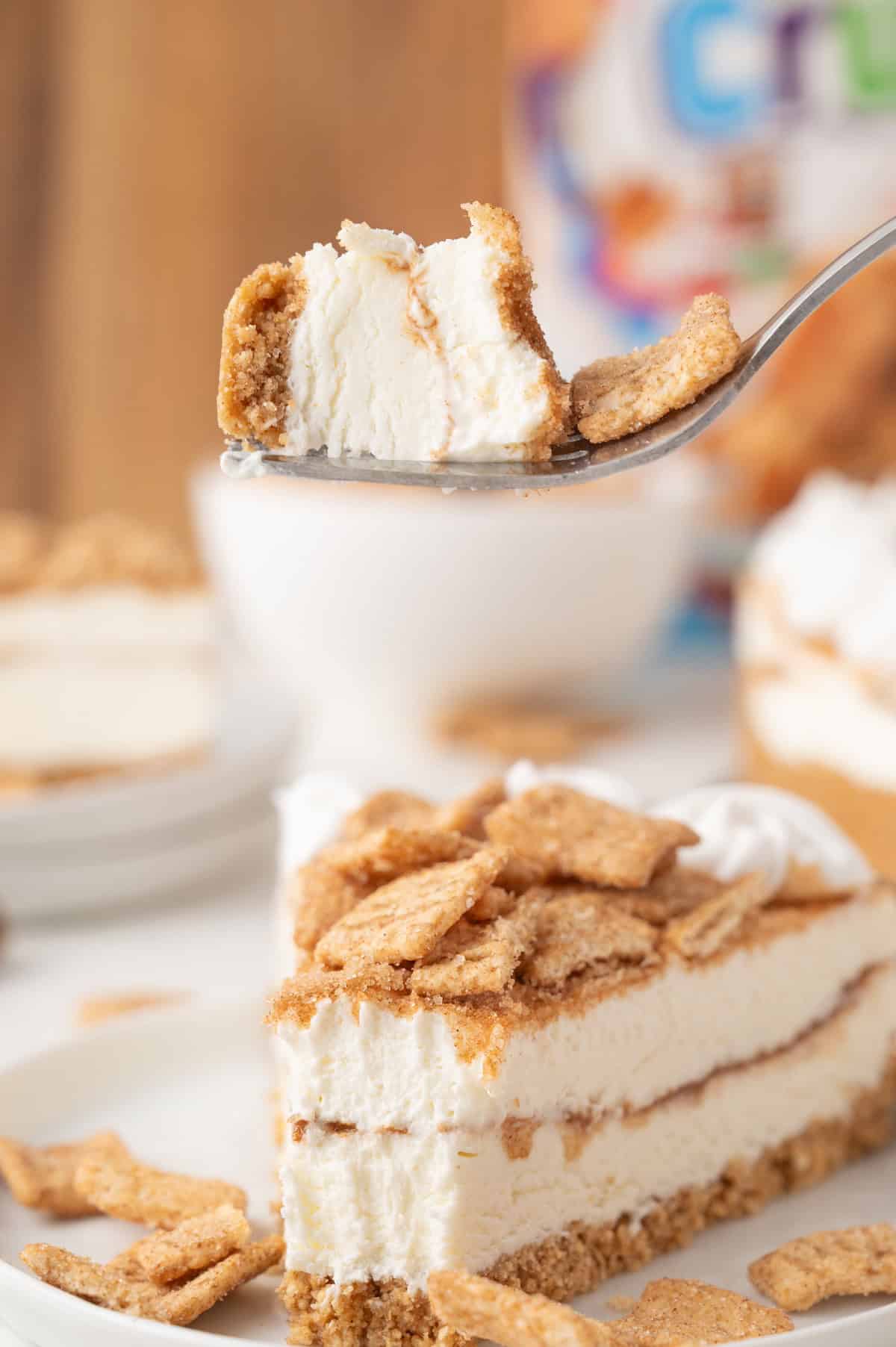 sliced Cinnamon Toast Crunch cheesecake on a fork
