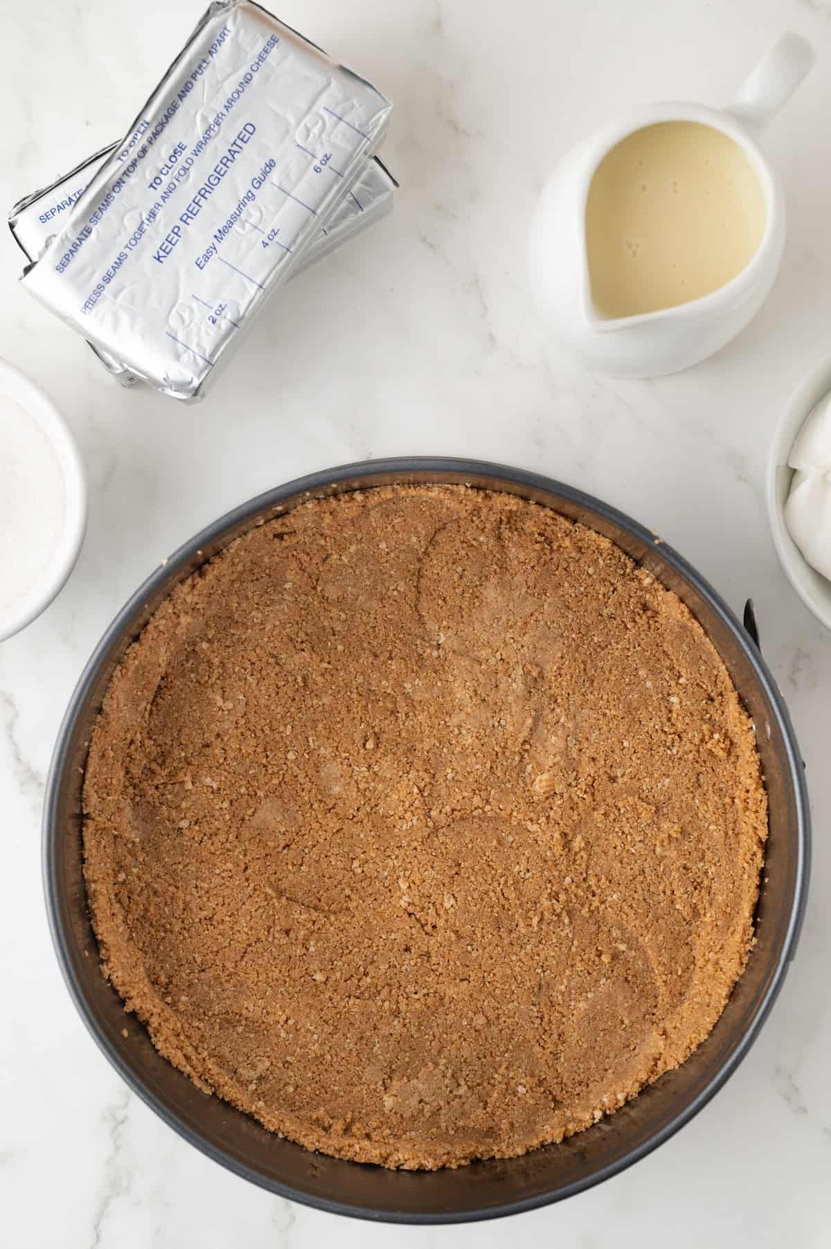 cheesecake crust pressed into a springform pan