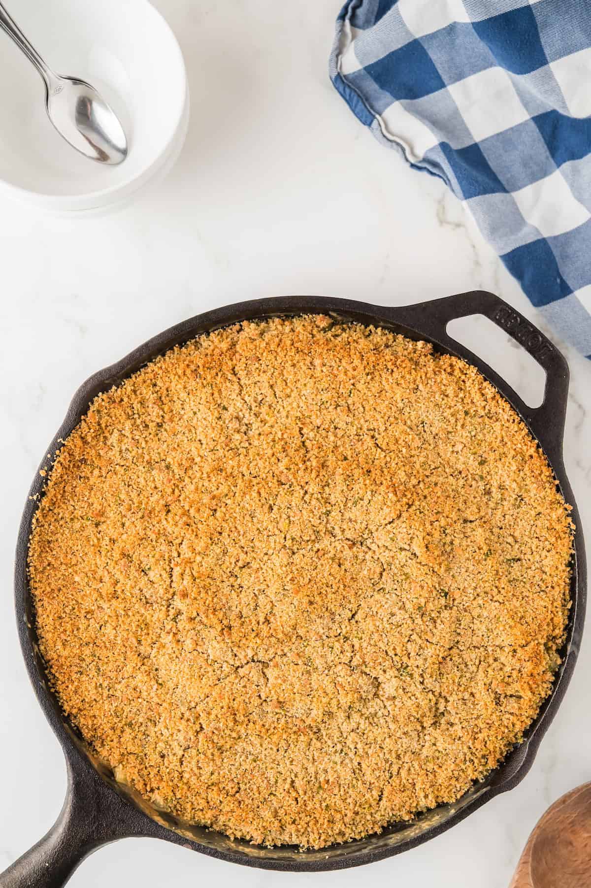skillet Mac and cheese baked with breadcrumbs on top