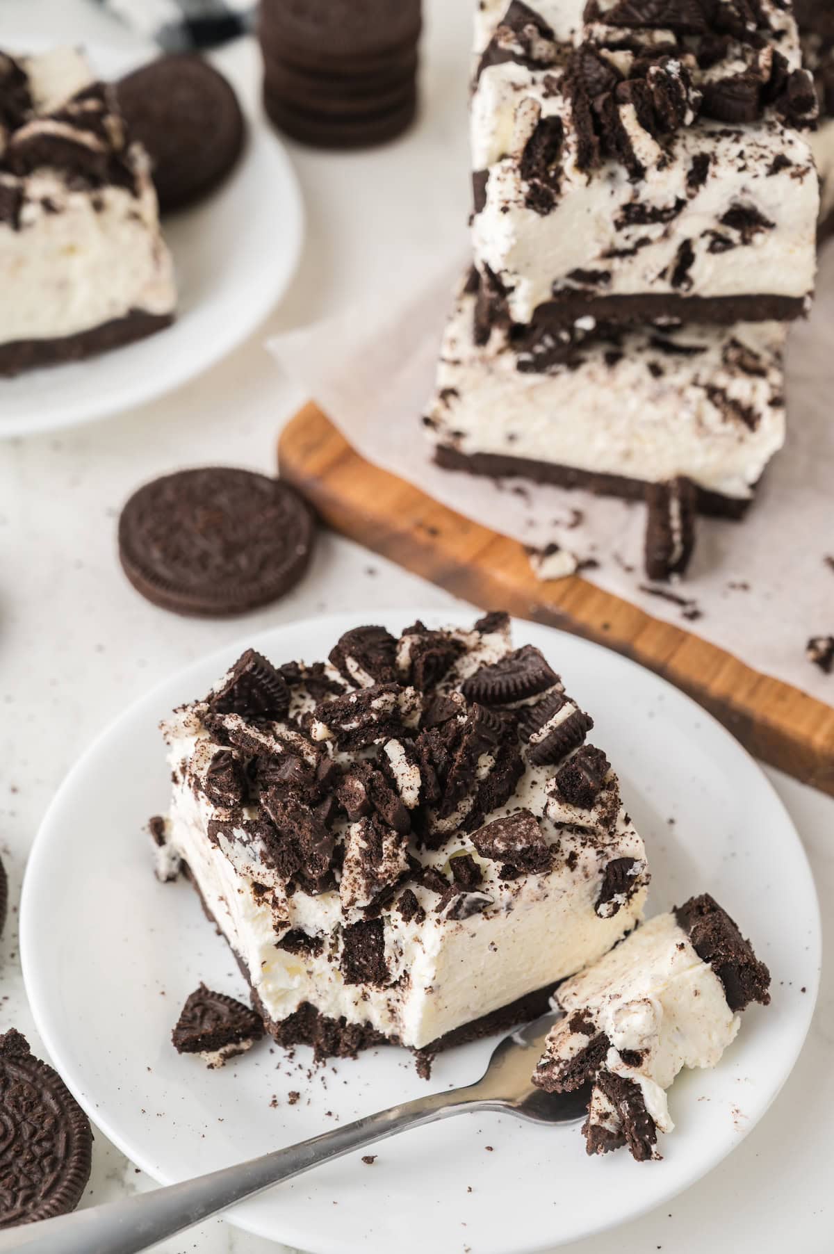 oreo cheesecake bar slice on a plate
