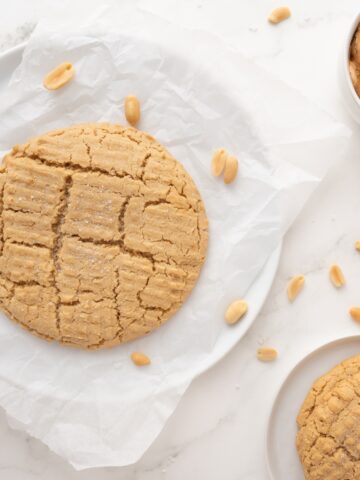 single serving peanut butter cookie on a white plate
