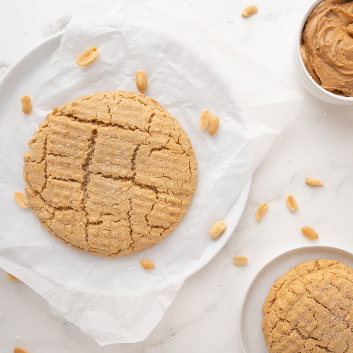 single serving peanut butter cookie on a white plate