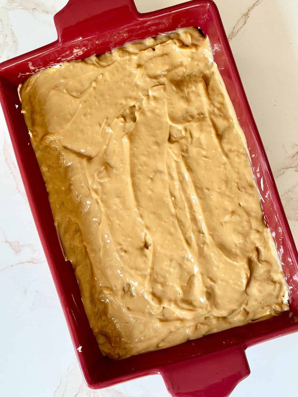 pudding layered on a cream cheese cake