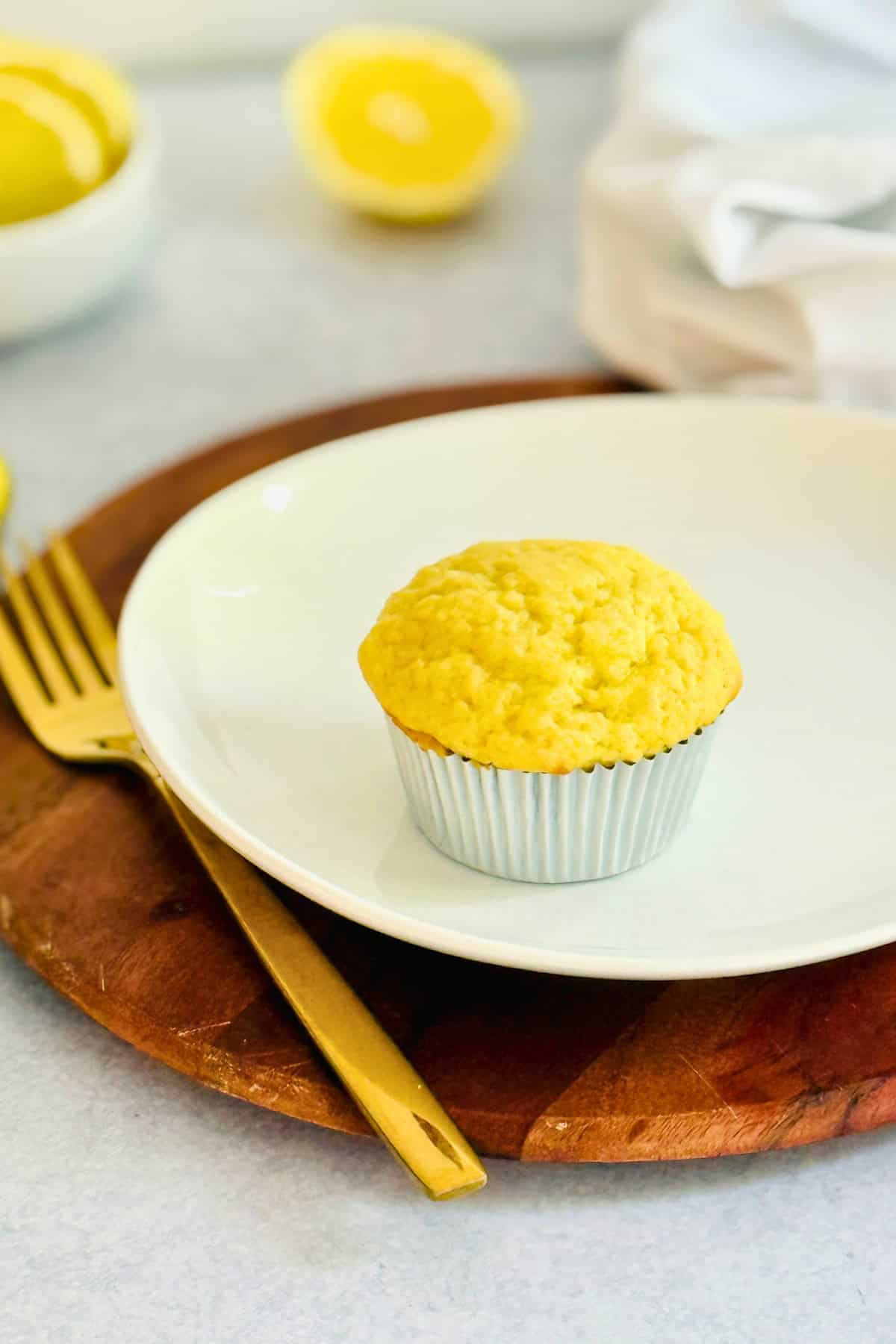 lemon muffin on a white plate
